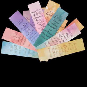 Colorful paper strips with handwritten messages fanned out on a black background.