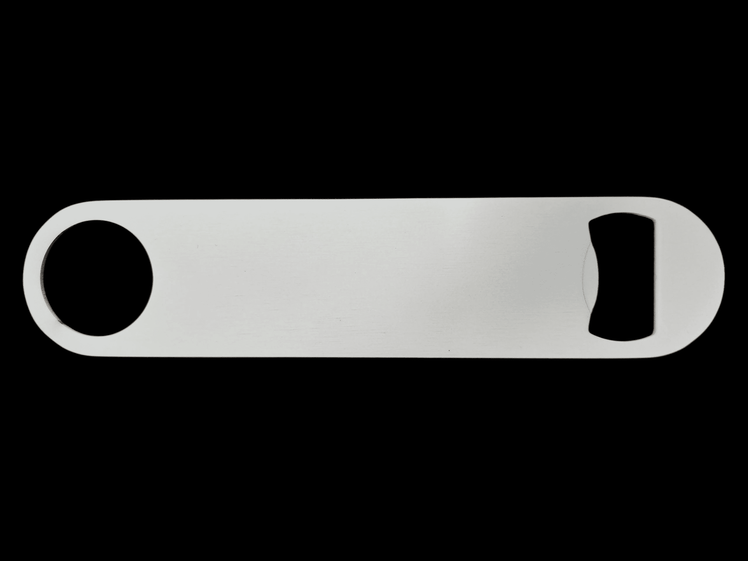 A white plastic level tool with black circular ends.