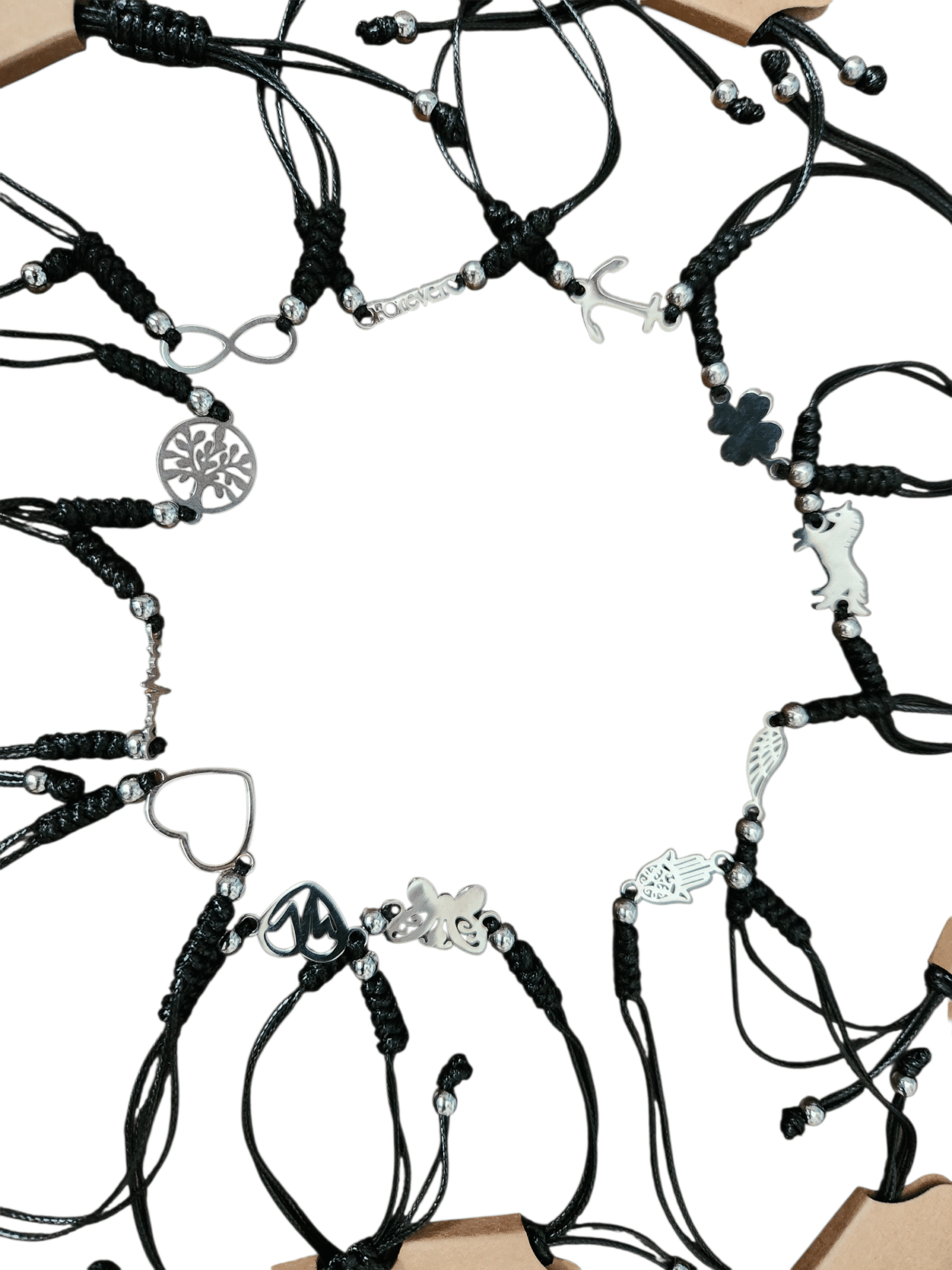 Circle of black leather harnesses with silver rings on a white background.