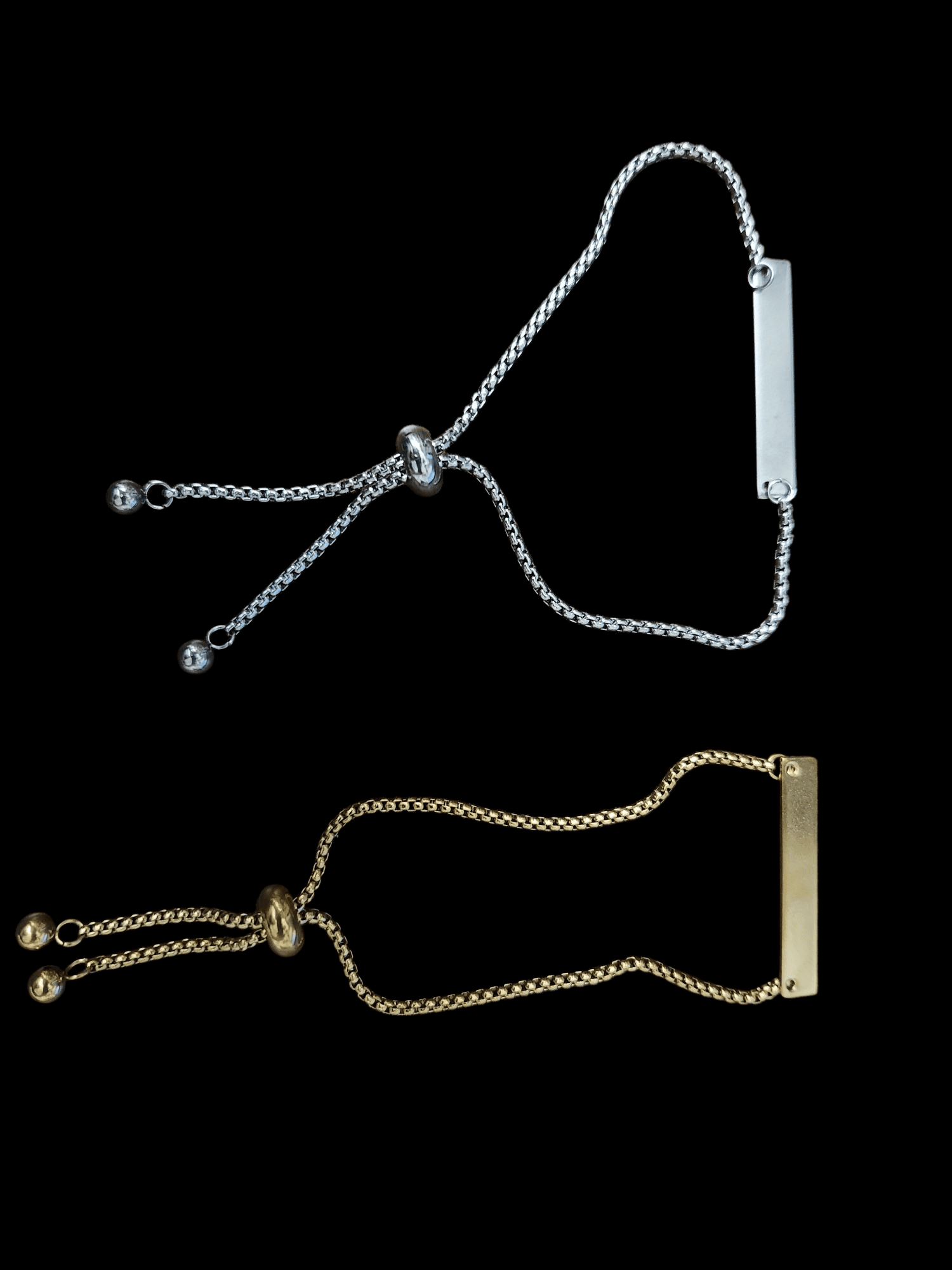 Two adjustable chain bracelets, one silver and one gold, each with a bar accent.