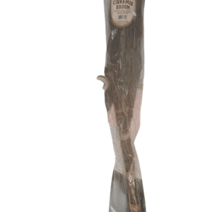 A wooden sculpture of a person with a carved face and elongated body.