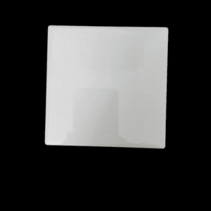 A white square tile with slight shadowing on a black background.