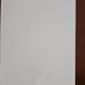 Blank white paper on a wooden surface.