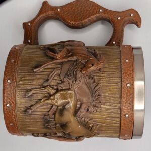 Wooden tankard with carved horse design and metal rim.