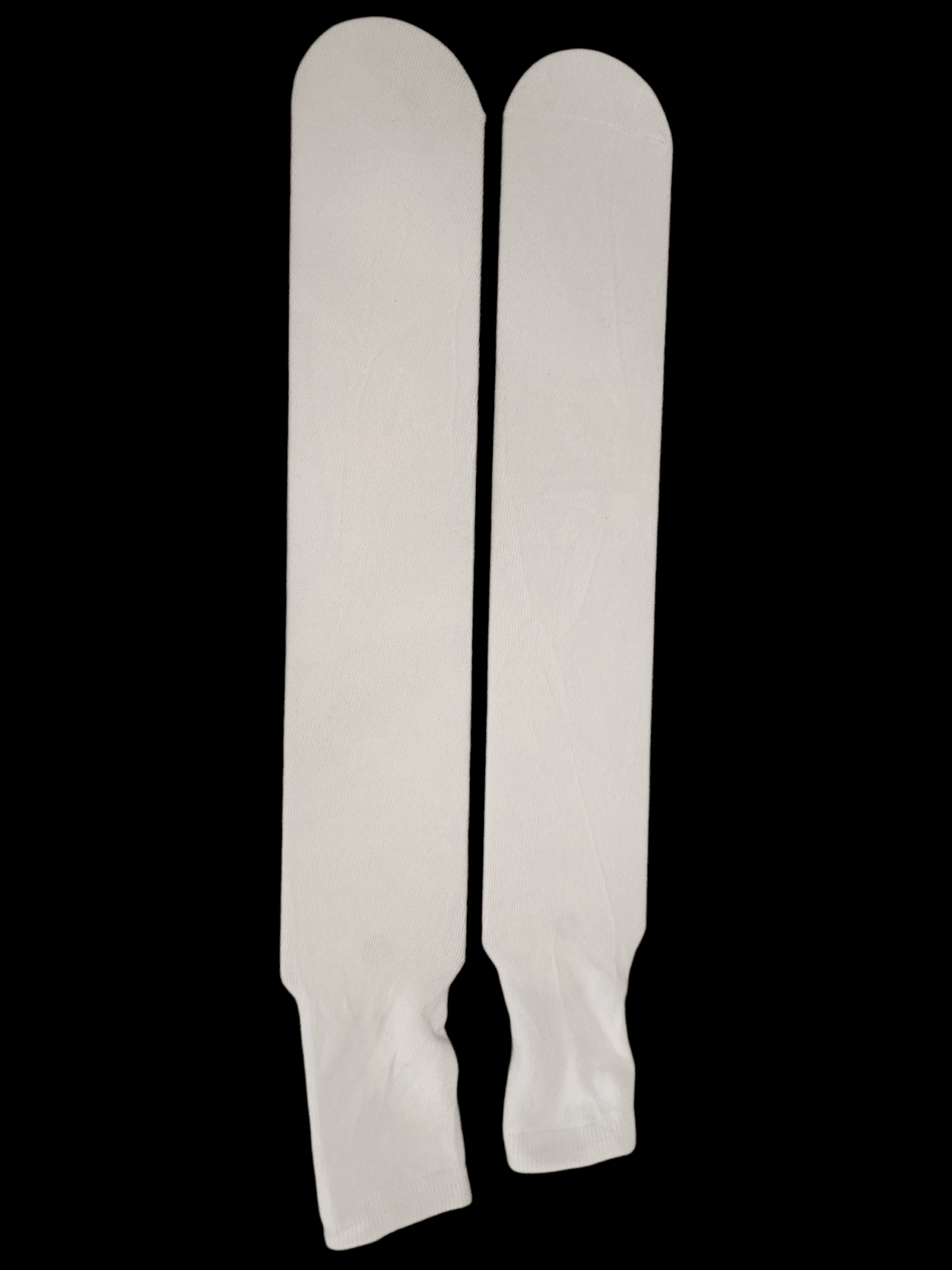 A close-up of a white, textured object with a vertical split on a black background.