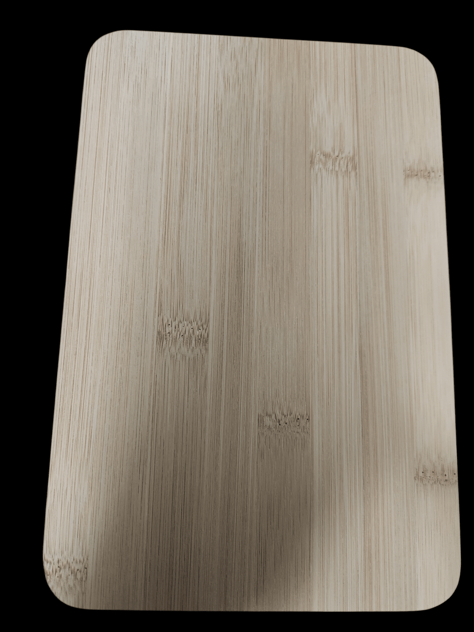 Close-up of a light wooden surface with natural grain patterns.