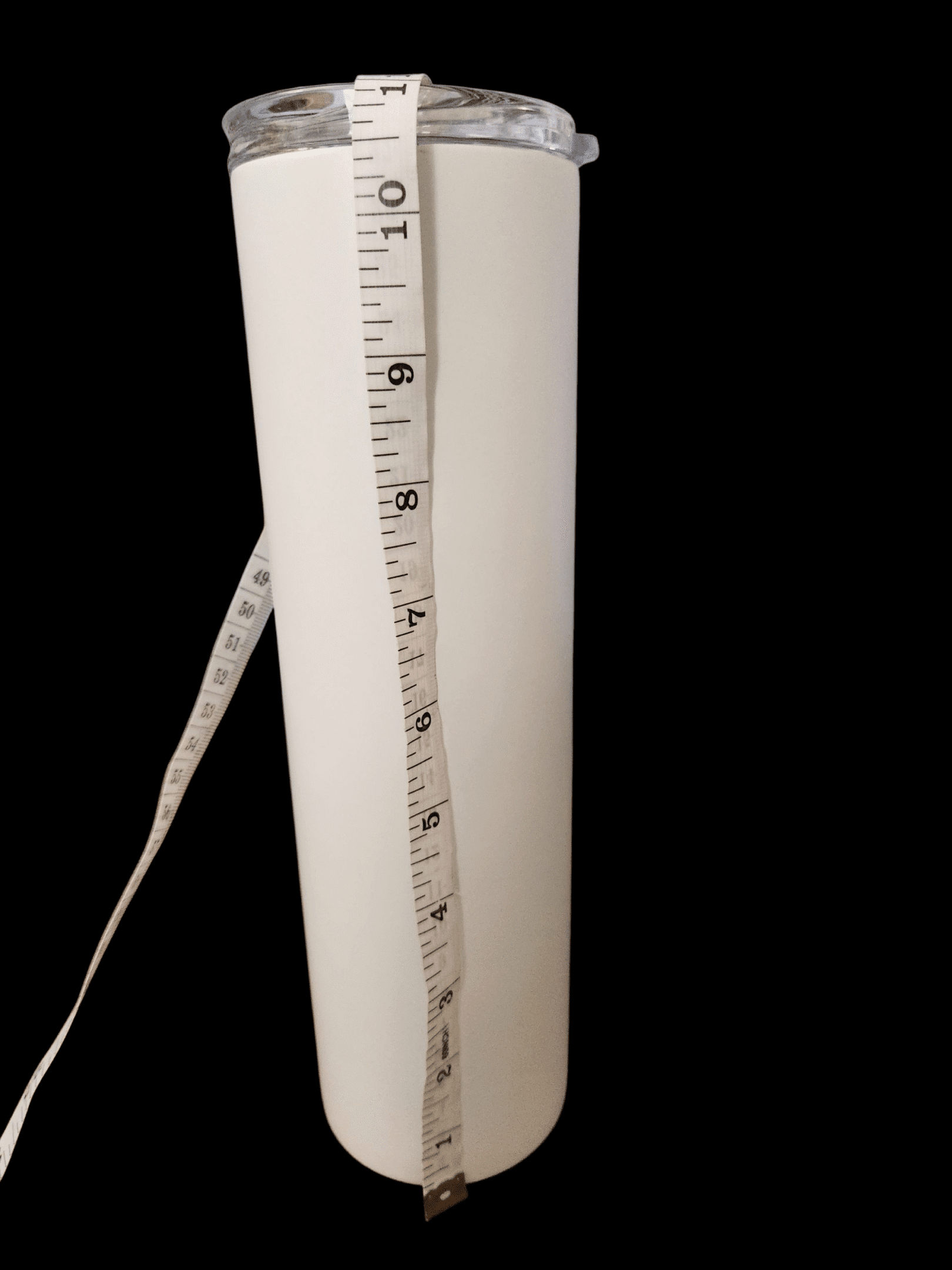 A measuring tape showing around 14 inches against a white background.