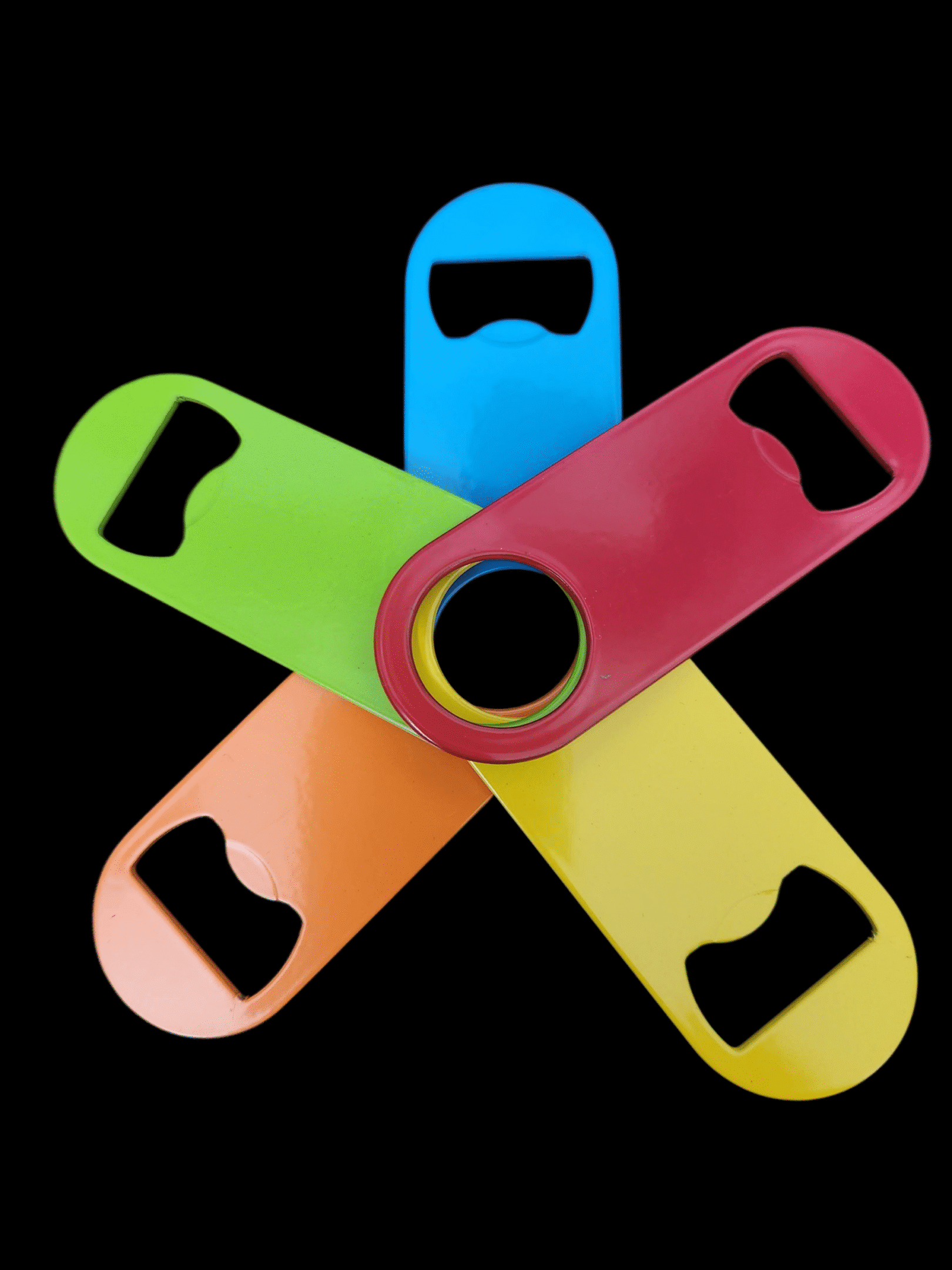 Colorful bottle openers arranged in a star pattern.