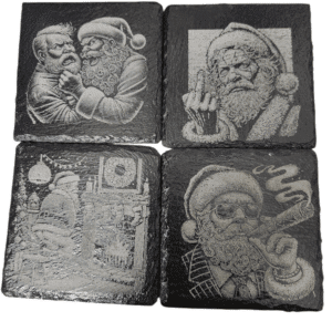 Four stone carvings of Santa Claus in various poses and styles.