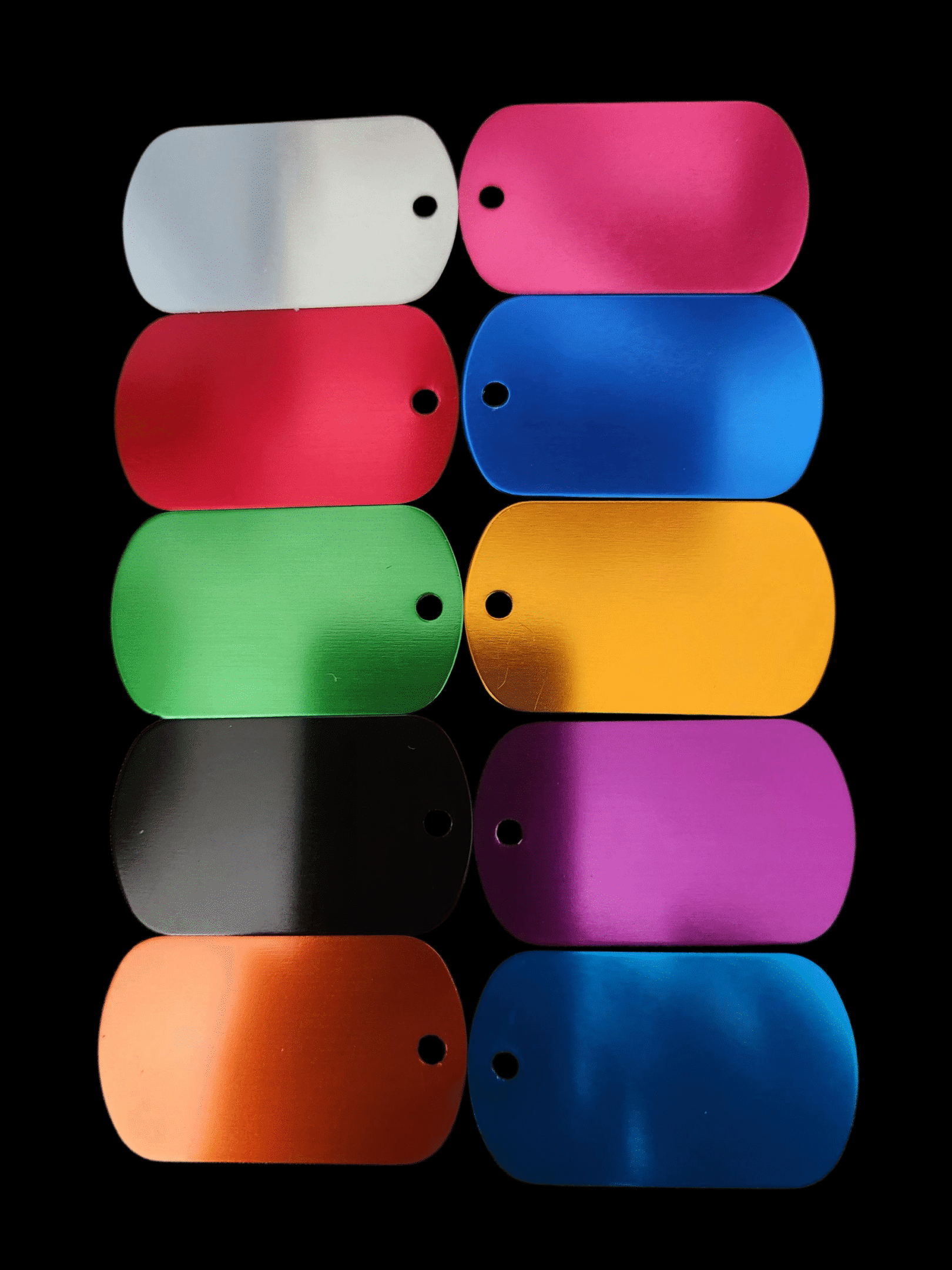 Colorful phone cases arranged in a grid on a black background.