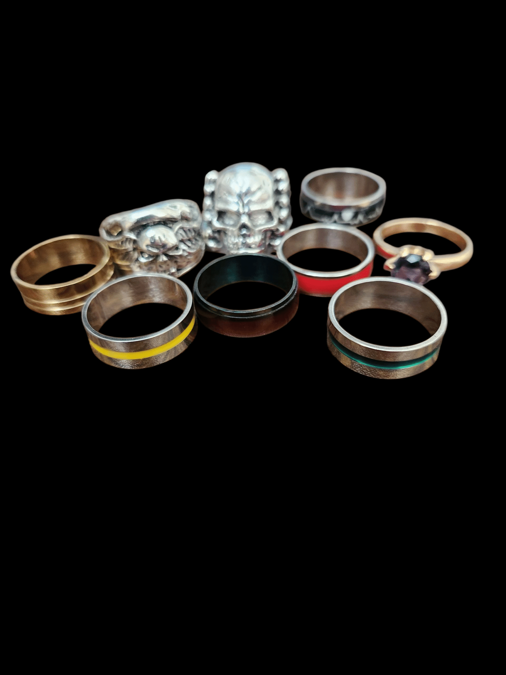 A collection of various rings with different designs and colors.