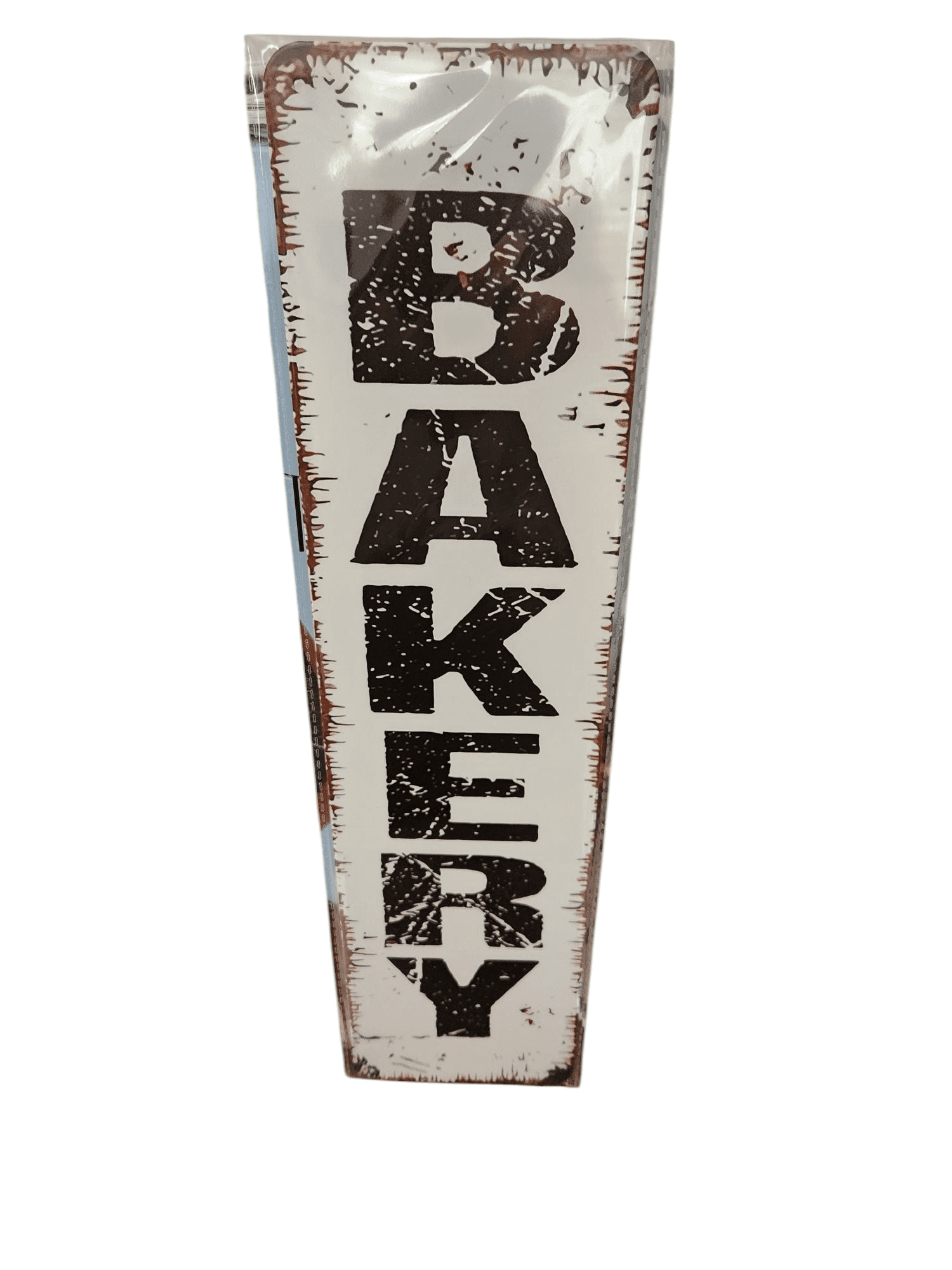 Rustic metal sign with the word 'BAKERY' in bold letters.