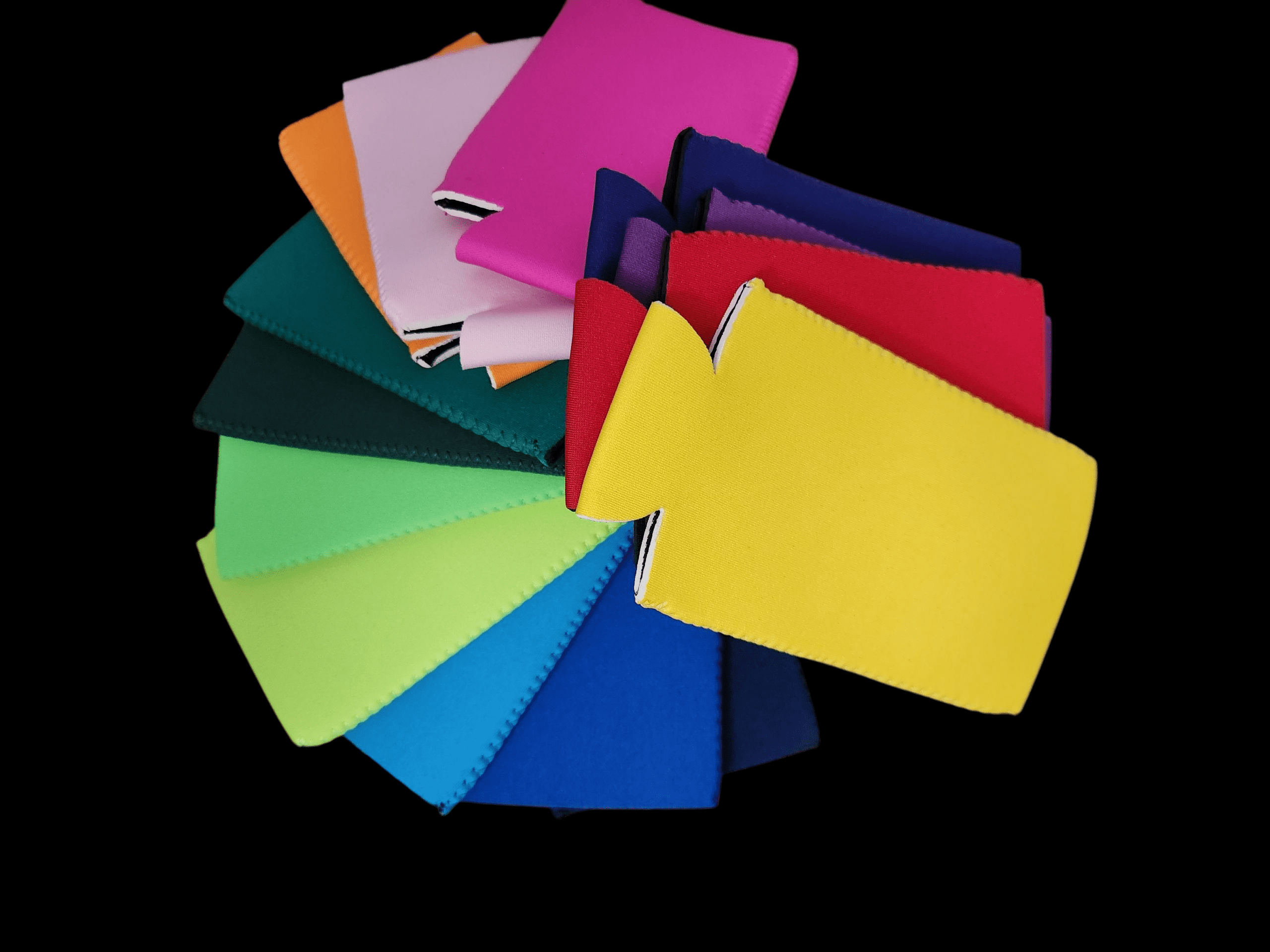 A colorful fan of fabric swatches arranged in a circular pattern.