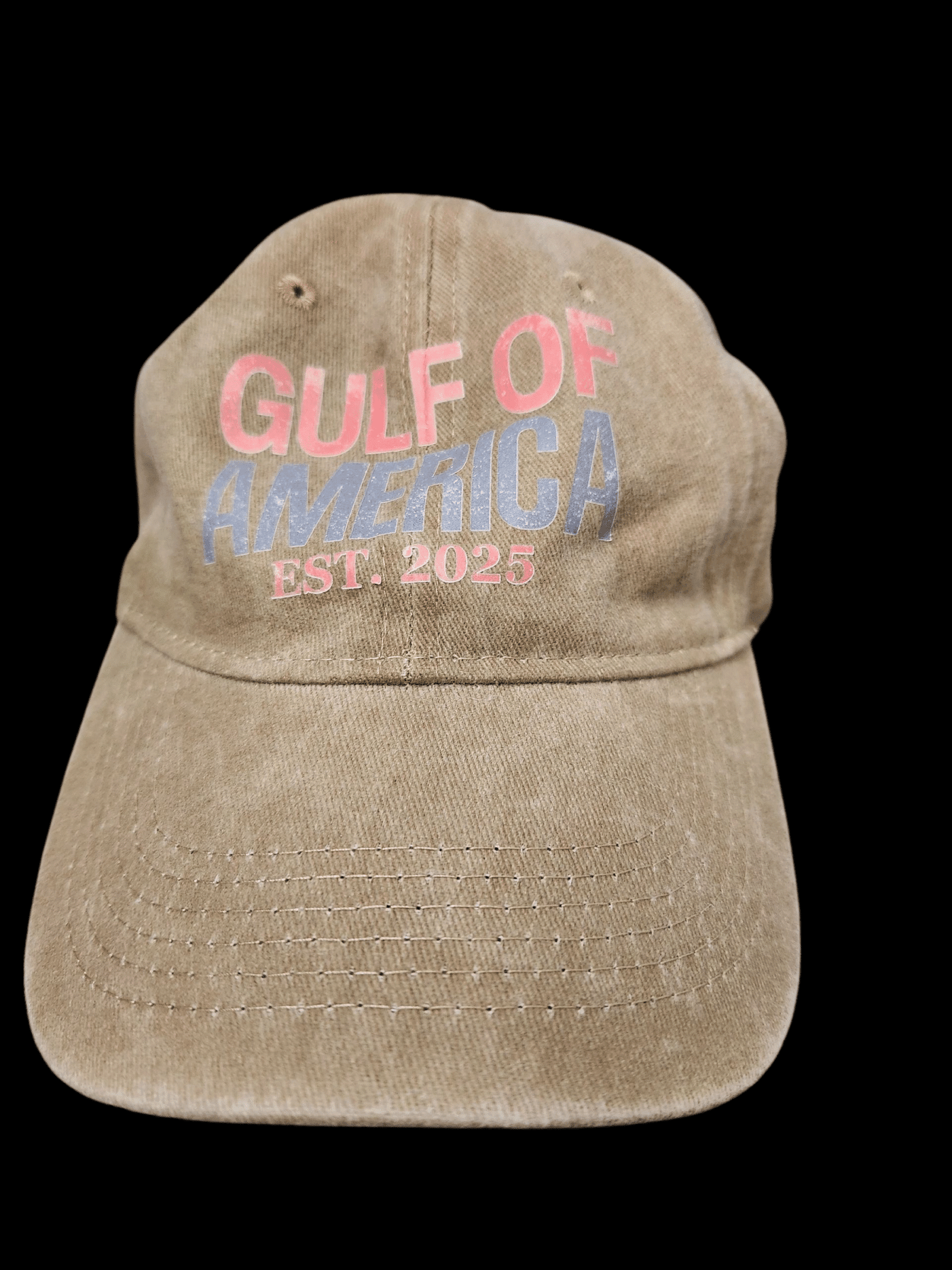 Worn beige cap with 'Gulf of America Est. 2003' text.