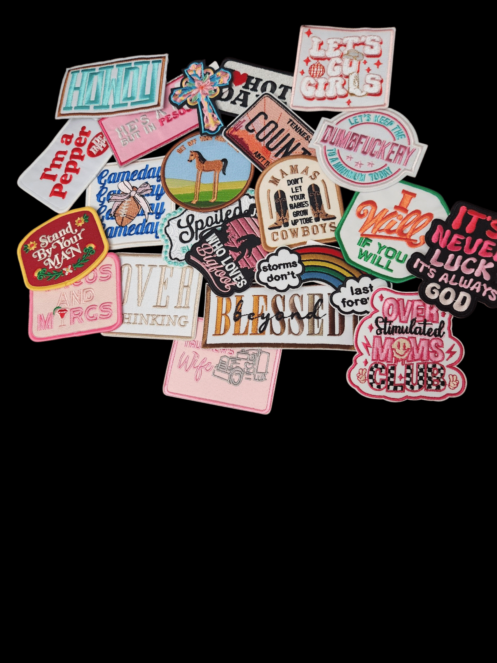 A collection of colorful, vintage-style patches with various designs and phrases.