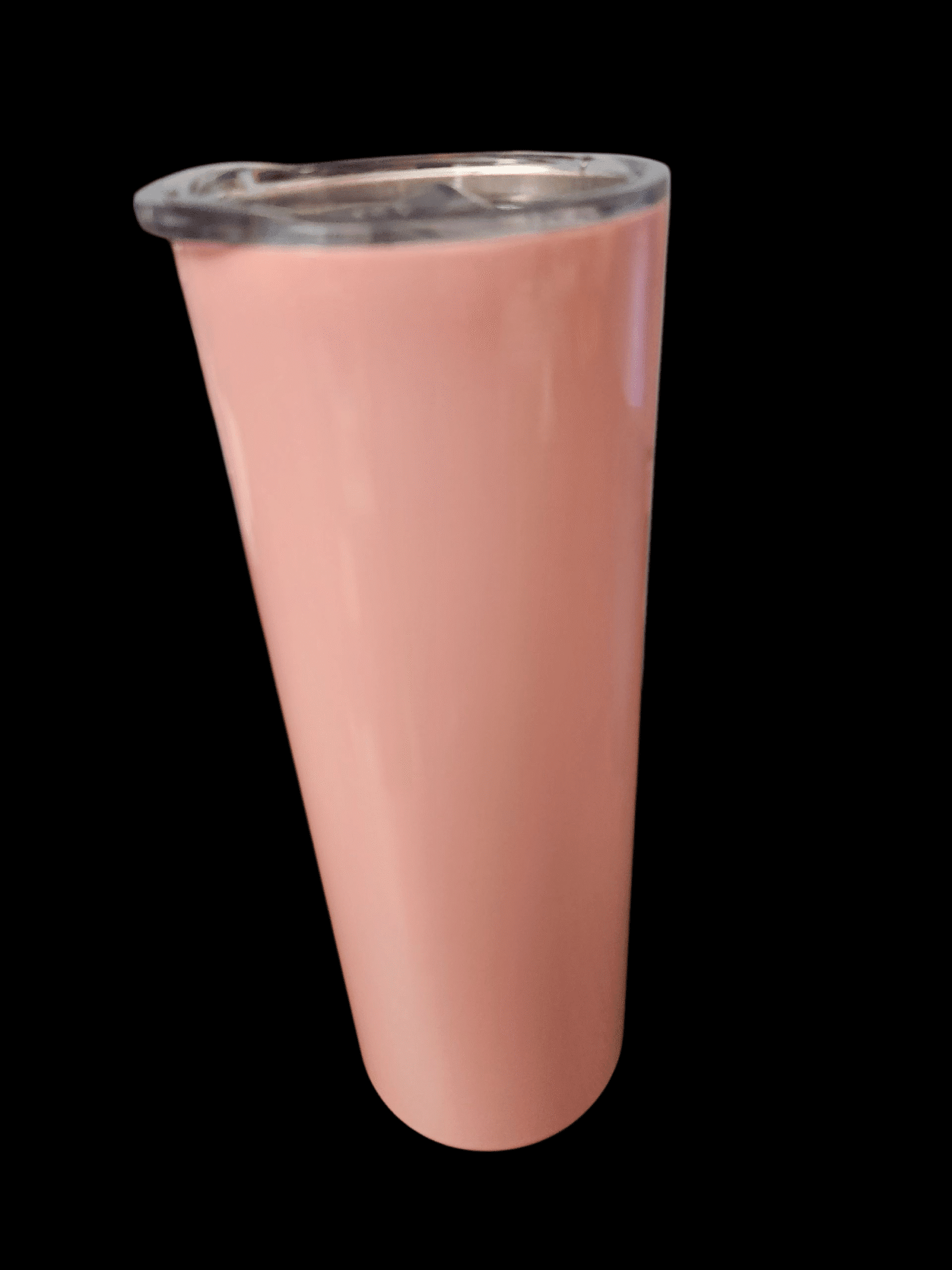 Tall glass filled with pink smoothie or milkshake.