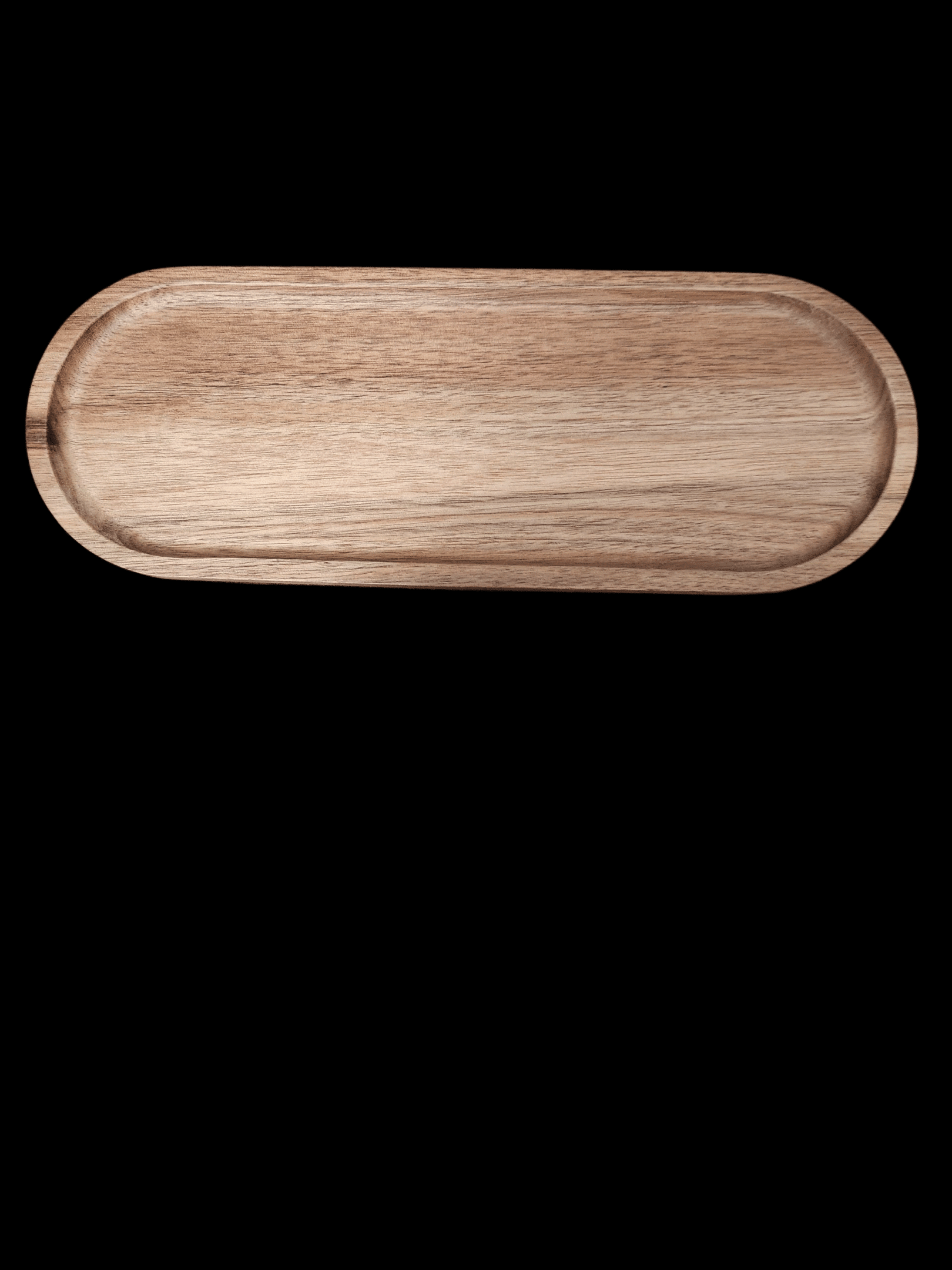 A wooden oval tray with a smooth finish and raised edges.