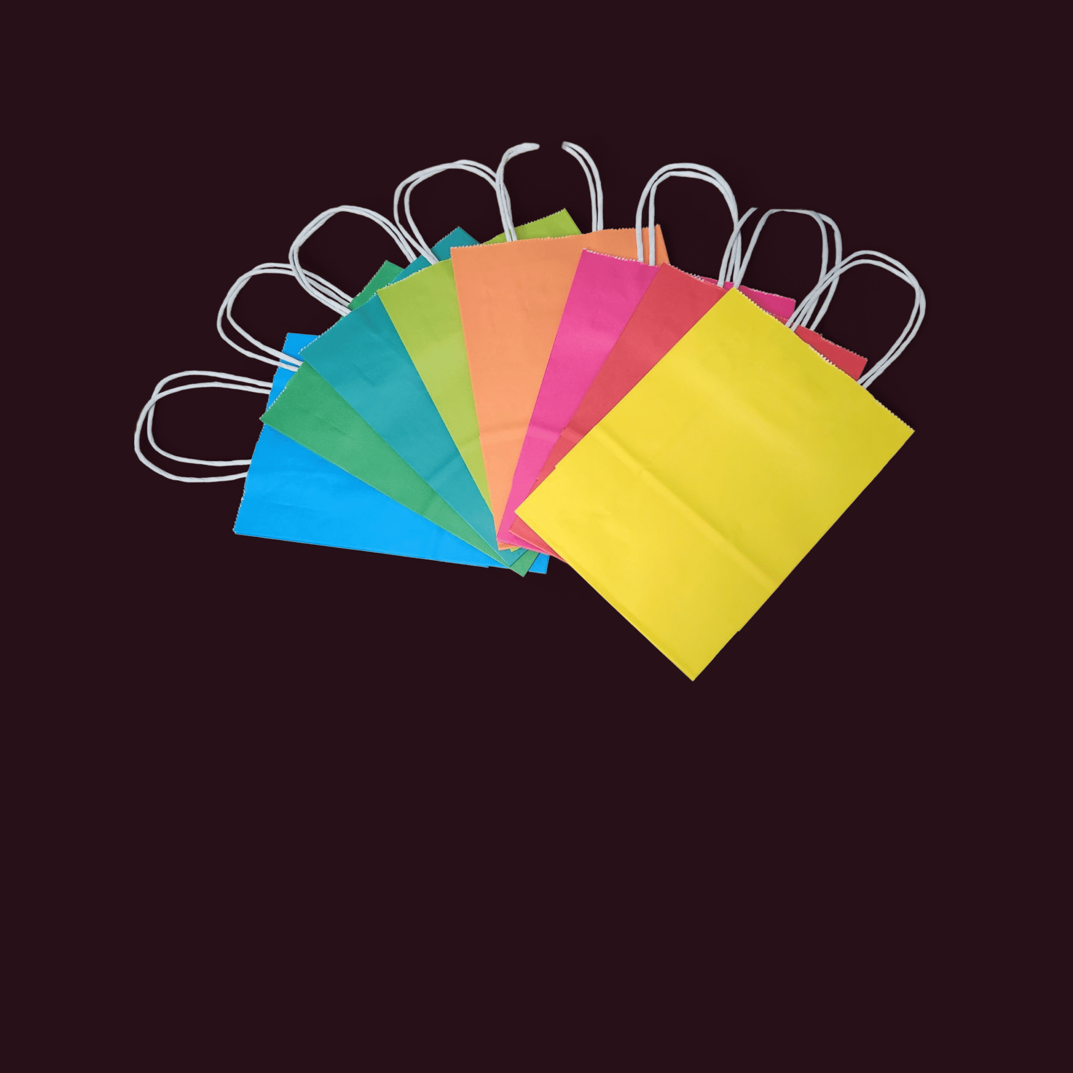 Colorful mesh bags with handles in various bright colors.
