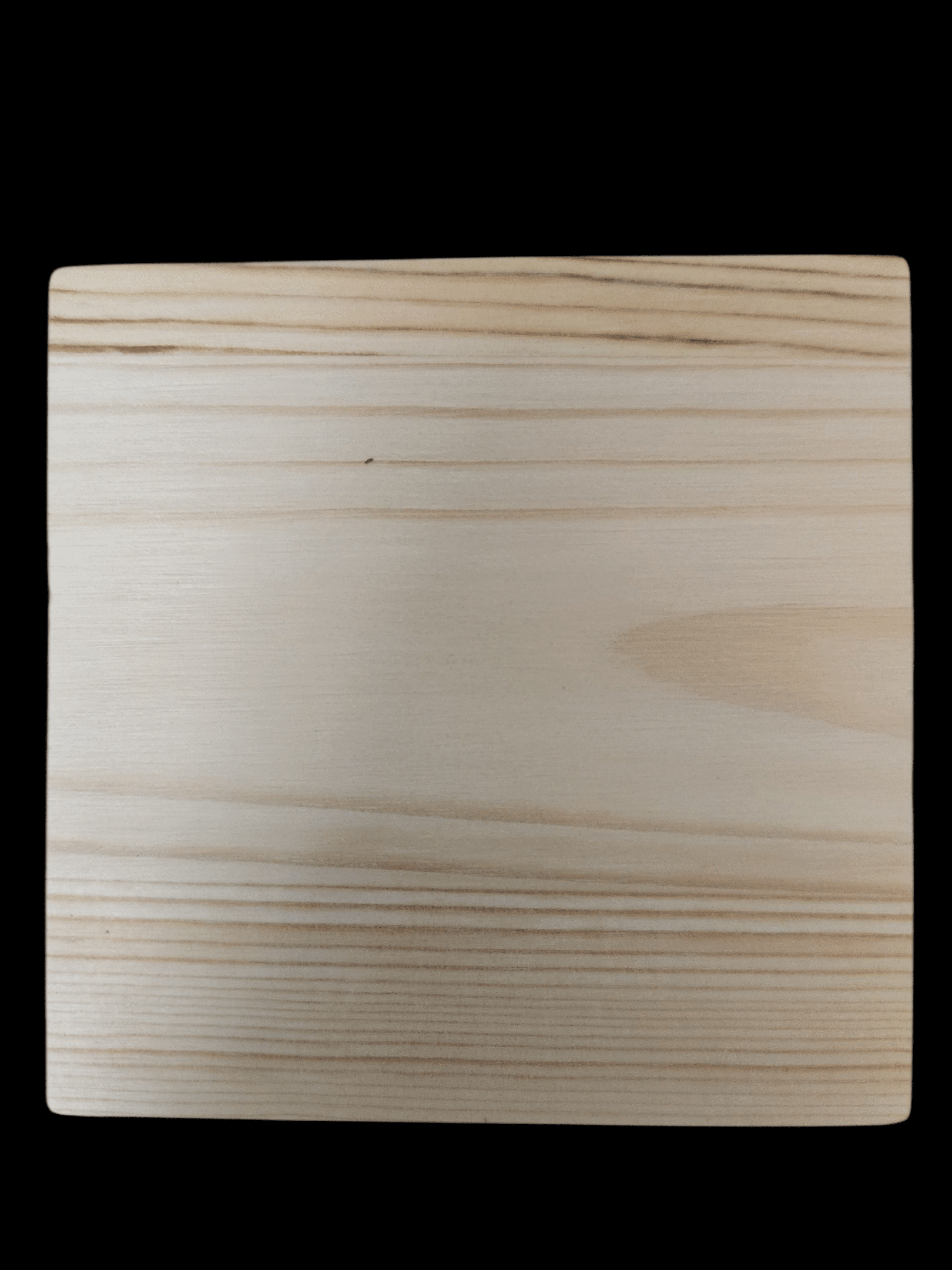 A square wooden panel with natural wood grain patterns.