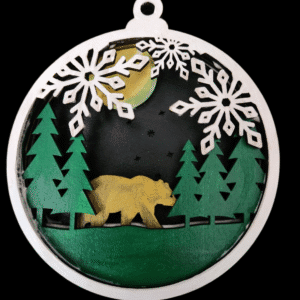 Decorative ornament featuring a bear and pine trees with snowflakes.