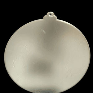A frosted glass Christmas ornament with a small loop for hanging.